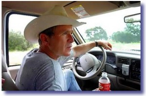 George Bush in his pick-up truck on his ranch in Crawford, TX.