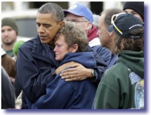 President Obama Comforts Woman