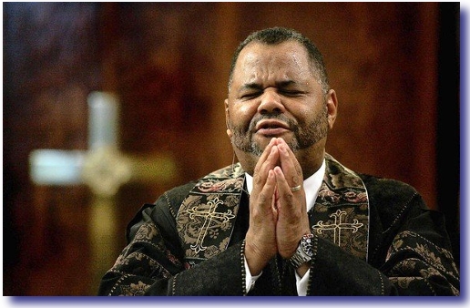 [Image: black_preacher_praying.jpg]